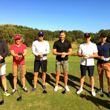 lads playing golf